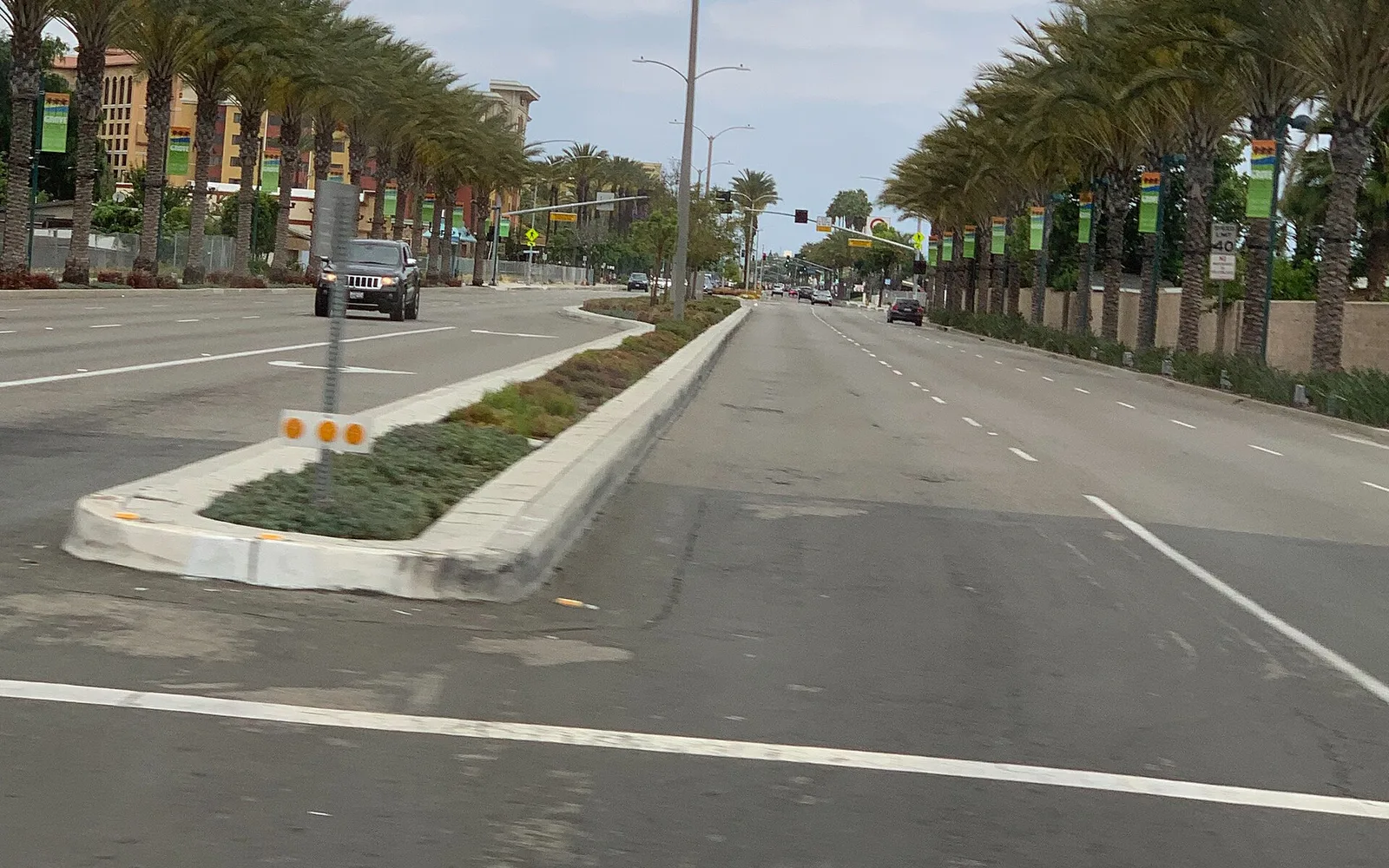 Harbor Boulevard in Garden Grove, with palms lining the roadway; regional Orange County context for La Habra.