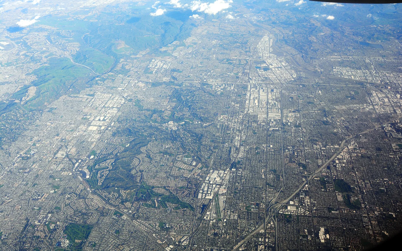 Regional aerial view toward La Habra, Fullerton, Yorba Linda and Anaheim.